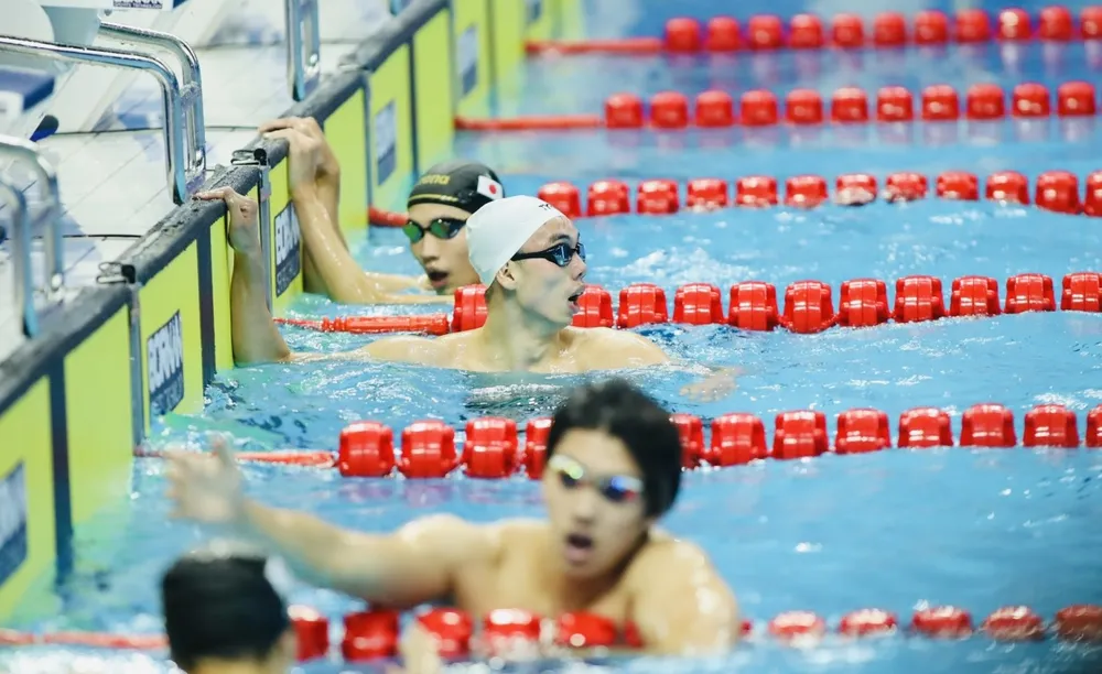 Người hâm mộ tiếc cho Huy Hoàng khi thua gang tấc tại nội dung 1.500m tự do trong tối thi đấu 26-9. Ảnh: LƯỢNG LƯỢNG