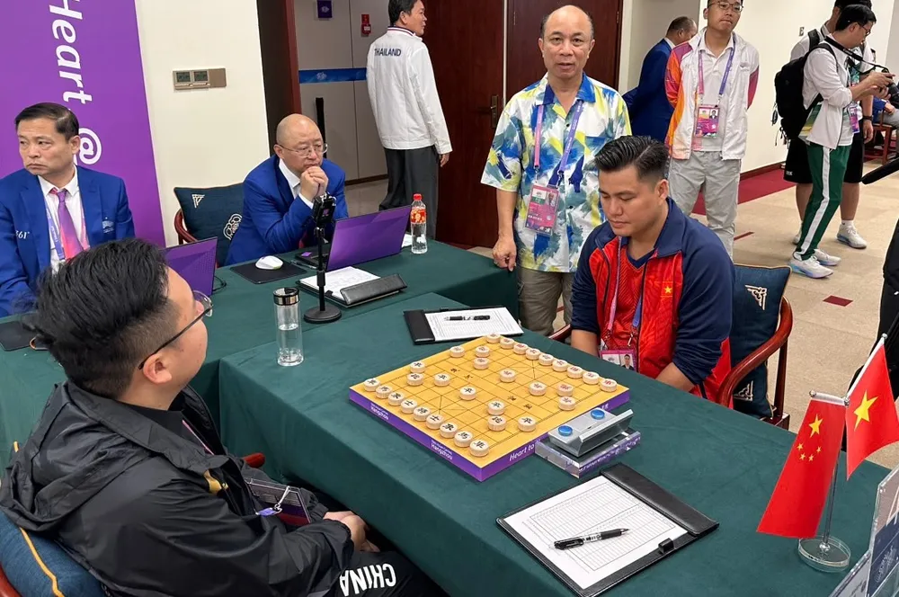 Lại Lý Huynh gặp đối thủ mạnh của chủ nhà Trung Quốc và có ván hòa đầu tiên. Ảnh: MINH MINH