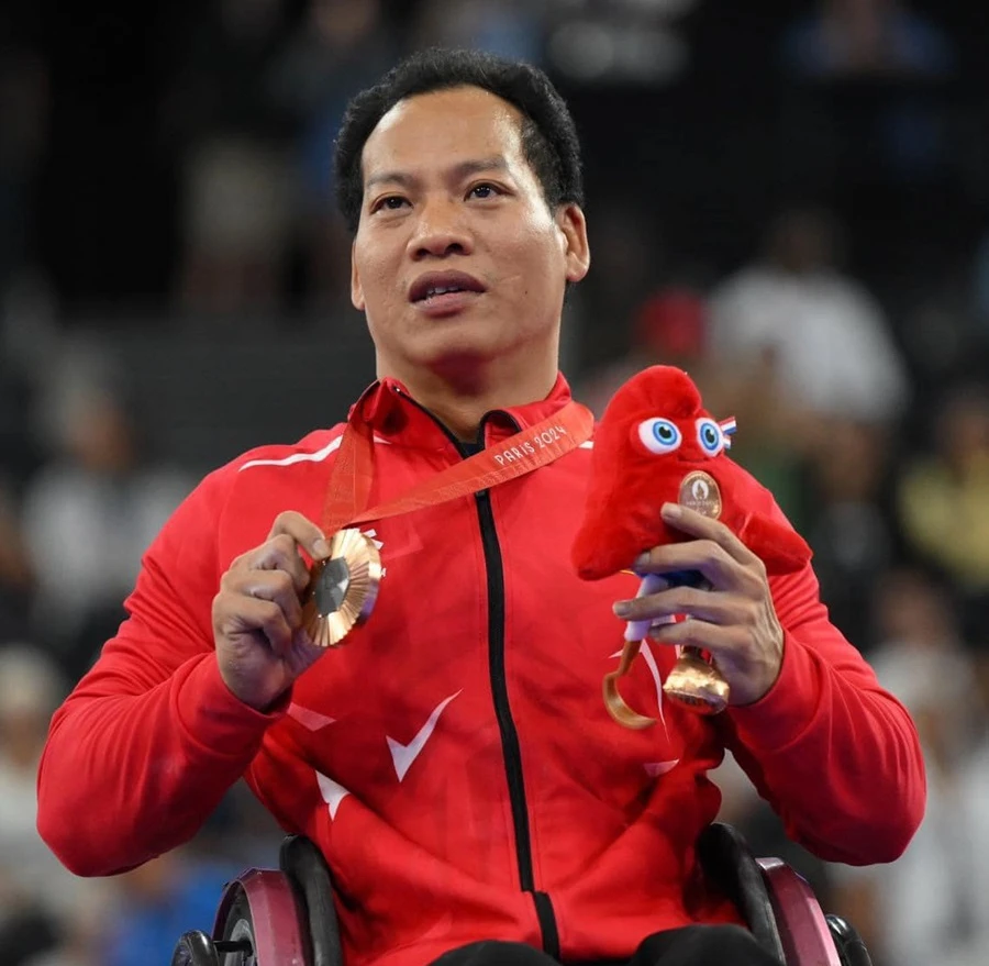 Lê Văn Công là VĐV thể thao người khuyết tật tiêu biểu toàn quốc 2024. Ảnh: PARALYMPIC