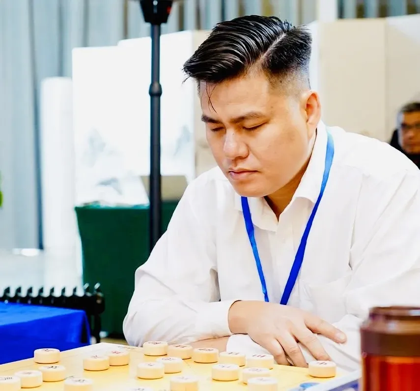 Kỳ thủ Lại Lý Huynh đã thi đấu cùng các đồng đội cờ tướng TPHCM để giành kết quả cao nhất. Ảnh: COTUONGVN
