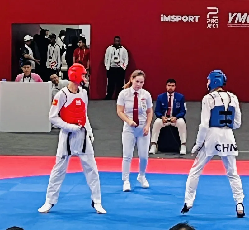 Tuyển thủ taekwondo Việt Nam tranh tài tại Bahrain. Ảnh: TRUNG THÀNH