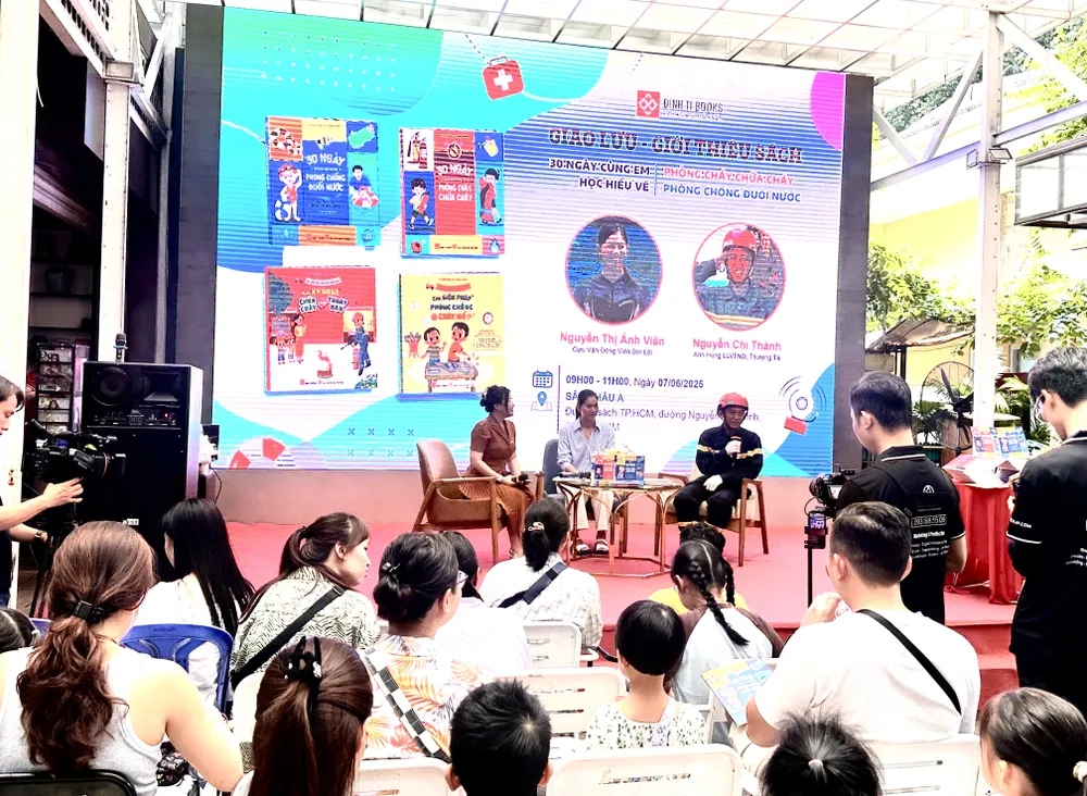 Hai khách mời Thượng tá Nguyễn Chí Thành và cựu kình ngư Nguyễn Thị Ánh Viên, chia sẻ tại chương trình IMG_1054.jpg