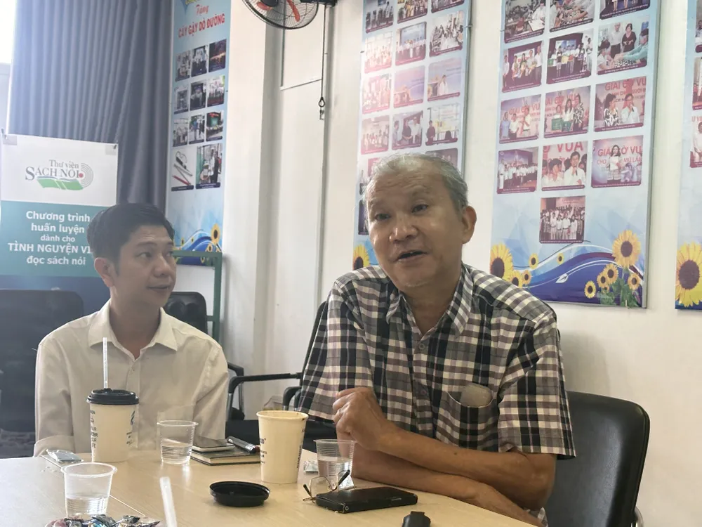 Mr. Tran Anh Khoi (left) and Mr. Duong Thanh Truyen, members of the Management Board of the Talking Book Fund for the Blind IMG_2434.JPG
