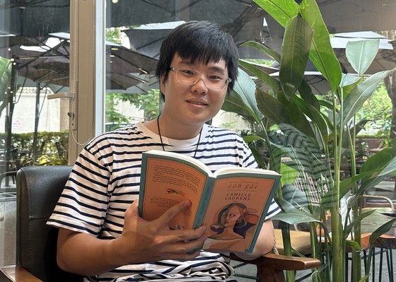 Huynh Huu Phuoc and his newly released translation "Girl" Huynh Huu Phuoc and his newly released translation "Girl"