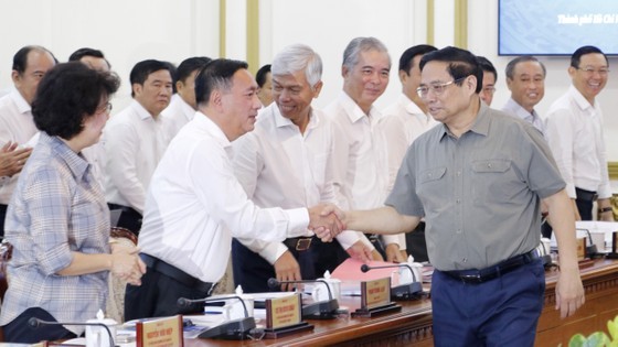 Prime Minister Pham Minh Chinh attends the meeting. Prime Minister Pham Minh Chinh attends the meeting.