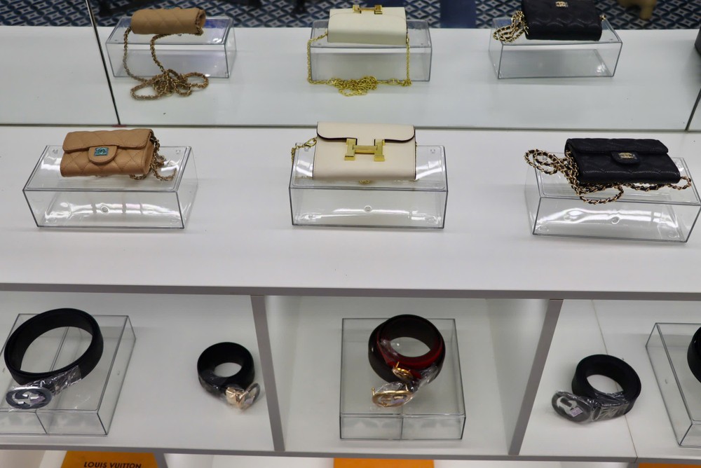 Both genuine and counterfeit items are on display. img-9959-4128-8497.jpeg.jpg