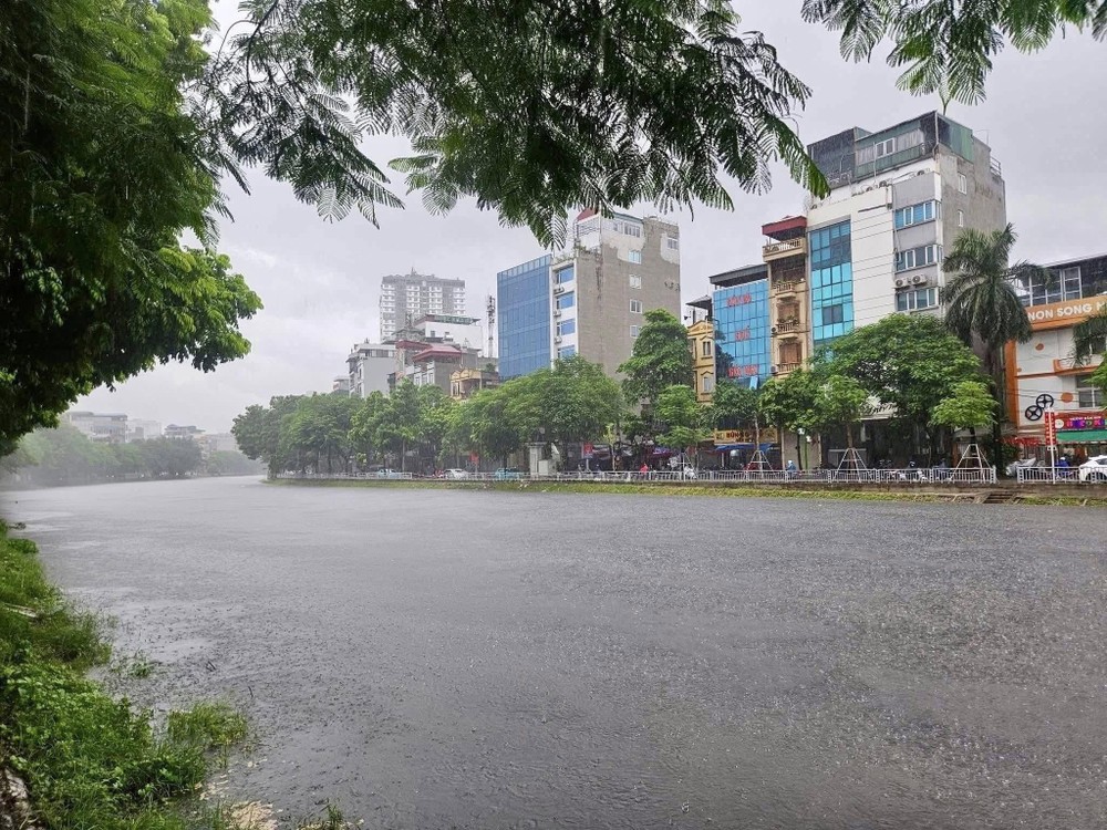 The To Lich River in Hanoi appears unusually clear and blue in the aftermath of the storm. img-1847-6412-97.jpeg.jpg