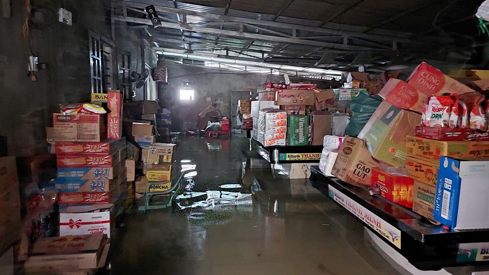 Floodwaters swept into houses and local businesses. 1000061848-3057-9787.jpg.jpg