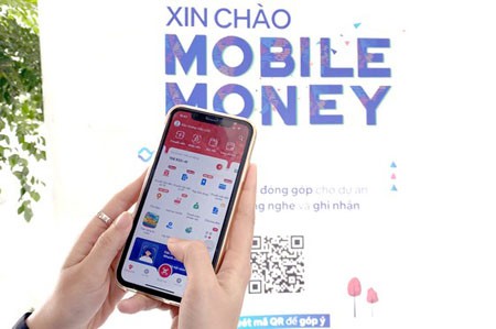 Viettel has successfully launched its pilot scheme for Mobile Money. (Photo: SGGP)