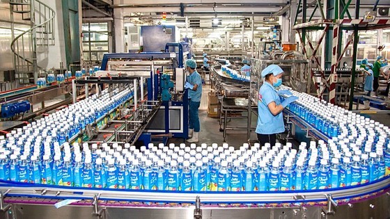 The manufacturing line for beverage of Tan Quang Minh Manufacture and Trading Co. Ltd (Photo: SGGP) The manufacturing line for beverage of Tan Quang Minh Manufacture and Trading Co. Ltd (Photo: SGGP)