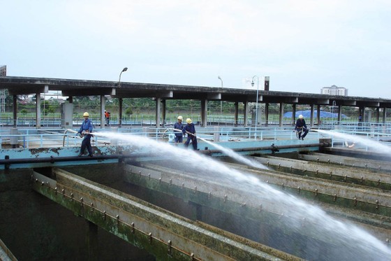 Employees at the water plant strive to ensure safe water supply during the dry season