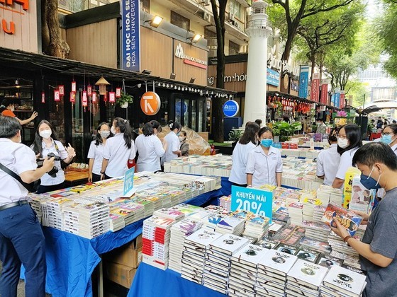 People are buying books on HCMC Book Street People are buying books on HCMC Book Street