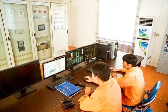An EVN employee is monitoring safe electricity operation