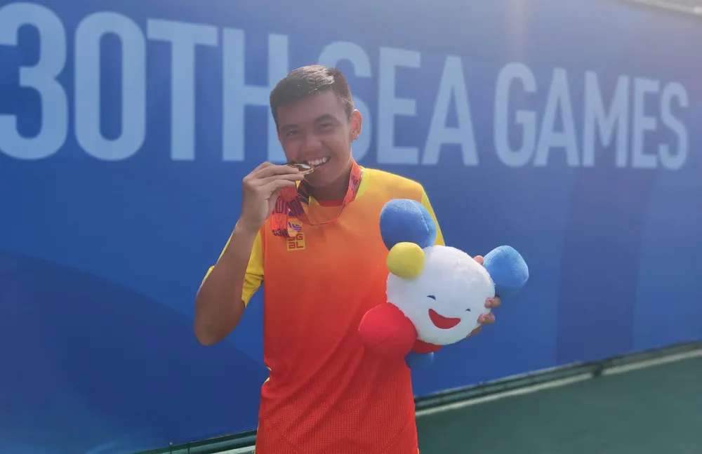 Khoảnh khắc Lý Hoàng Nam đoạt tấm HCV lịch sử cho quần vợt Việt Nam ảnh 6
