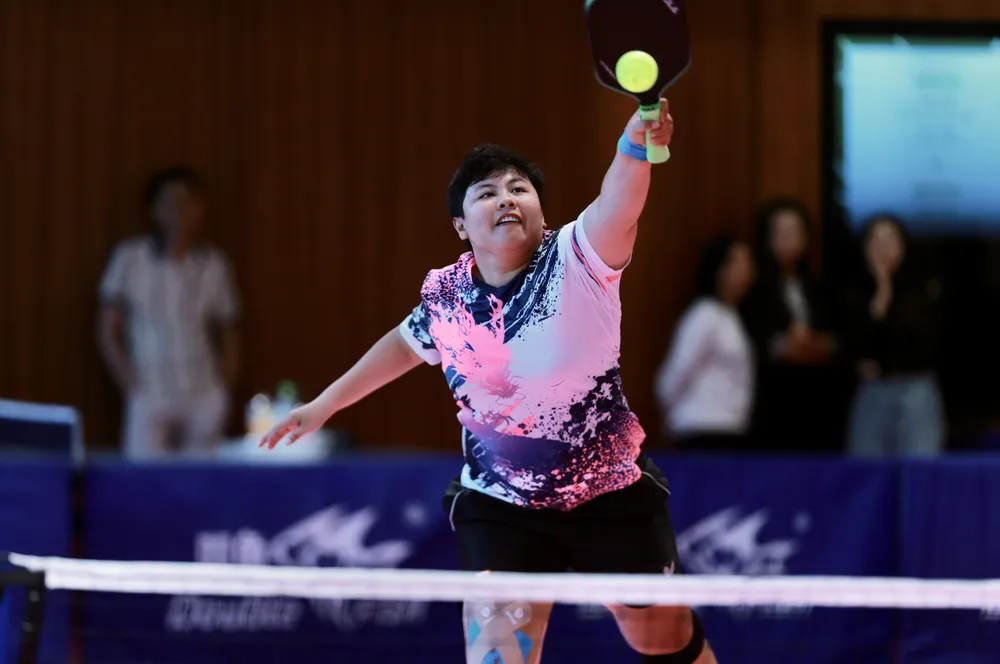VĐV Mai Hoàng Mỹ Trang thi đấu môn Pickleball. 61d90fff8e50370e6e41.jpg