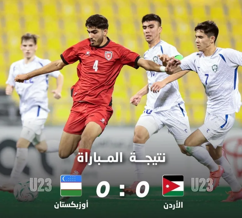 Cuộc so tài bất phân thắng bại giữa U23 Syria (áo đỏ) và U23 Uzbekistan.