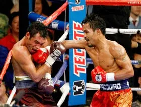 Pacquiao hạ knock-out kỹ thuật Oscar De la Hoya: Cuộc lật đổ ngoạn mục
