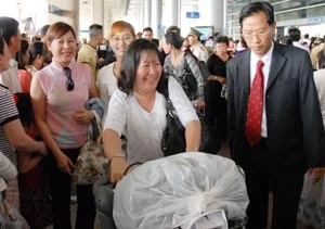 Kiều bào về nước ở nhà thuê, ăn tết bình dân… ảnh 2 Kiều bào về nước ở nhà thuê, ăn tết bình dân… ảnh 2
