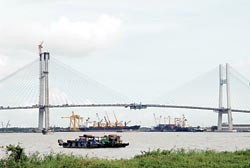 The Phu My Bridge connecting Districts 2 and 7 over the Sai Gon River in HCMC will open to traffic on September 2 (Photo: Thanh Nien) The Phu My Bridge connecting Districts 2 and 7 over the Sai Gon River in HCMC will open to traffic on September 2 (Photo: Thanh Nien)