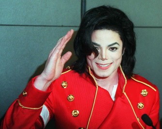 Michael Jackson waves to photographers during a press conference in Paris on March 19, 1996 (AFP filed photo) Michael Jackson waves to photographers during a press conference in Paris on March 19, 1996 (AFP filed photo)