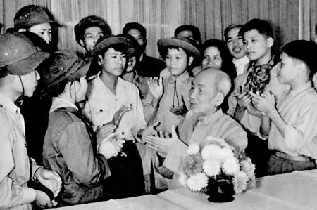 The file photo shows President Ho Chi Minh welcoming couragous children from the south. The file photo shows President Ho Chi Minh welcoming couragous children from the south.