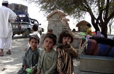 Pakistani tribal families of South Waziristan area fleeing their hometown, arrive in Miran Shah, capital of Pakistani tribal area of North Waziristan. Pakistani tribal families of South Waziristan area fleeing their hometown, arrive in Miran Shah, capital of Pakistani tribal area of North Waziristan.