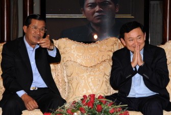 In this handout photo provided by the Prime Minister office, former Thai Prime Minister Thaksin Shinawatra (R) sits with Cambodian Prime Minister Hun Sen (L) at a house that Hun Sen prepared for Thaksin in Phnom Penh on November 10, 2009 (AFP) In this handout photo provided by the Prime Minister office, former Thai Prime Minister Thaksin Shinawatra (R) sits with Cambodian Prime Minister Hun Sen (L) at a house that Hun Sen prepared for Thaksin in Phnom Penh on November 10, 2009 (AFP)