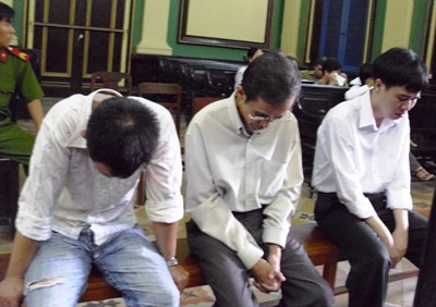 Three defendants at the court. Three defendants at the court.