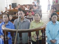 Nguyen Thi Ngoc Yen (1st, L) and her accomplices in the dock on Wednesday.