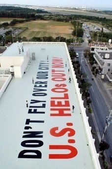 A Ginowan city government file photo shows a rooftop message referring to the controversial US Futenma airbase on the southern Japanese island of Okinawa. (AFP Photo) A Ginowan city government file photo shows a rooftop message referring to the controversial US Futenma airbase on the southern Japanese island of Okinawa. (AFP Photo)