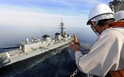Japan's naval forces refuel a Japanese destroyer (left) in the Indian Ocean to support coalition ships assisting in the US-led war in Afghanistan on January 14. Japan's naval forces refuel a Japanese destroyer (left) in the Indian Ocean to support coalition ships assisting in the US-led war in Afghanistan on January 14.