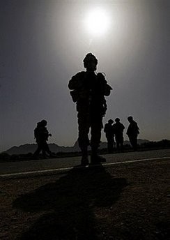 Canadian soldiers with the NATO-led International Security Assistance Force (ISAF) stand guard during a patrol in Panjwayi district, some 30 Kms to the west of Kandahar province, in 2008. (AFP Photo) Canadian soldiers with the NATO-led International Security Assistance Force (ISAF) stand guard during a patrol in Panjwayi district, some 30 Kms to the west of Kandahar province, in 2008. (AFP Photo)