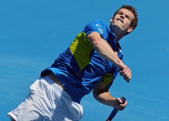 Murray throws his wristband into the crowd as he celebrates his victory over John Isner of the US in their men's singles fourth round match on day seven of Australian Open in Melbourne on January 24. AFP photo