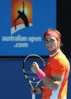 Nadal celebrates winning a point against Ivo Karlovic of Croatia in their men's singles fourth round match on day seven of the Australian Open tennis tournament in Melbourne Jan. 24 (AFP photo)