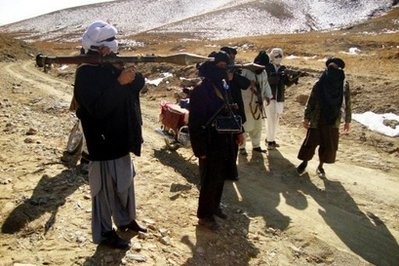 Taliban fighters display their weapons during a patrol in Ghazni province on January 23. Taliban fighters display their weapons during a patrol in Ghazni province on January 23.