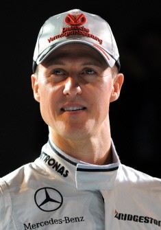 Schumacher poses during the presentation of the new Mercedes GP Petronas Formula 1 team, at the Mercedes Museum in Stuttgart, southern Germany, on January 25, 2010 (AFP photo)