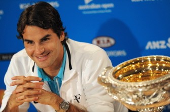 Federer smiles during a press conference following his victory over Andy Murray early on February 1, 2010. AFP PHOTO Federer smiles during a press conference following his victory over Andy Murray early on February 1, 2010. AFP PHOTO