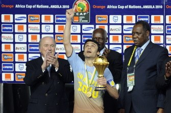 Kamel Ahmed Hassan (C) Captain of Egypt reacts as he receives the African Cup of Nations trophy after winning their final match of the African Cup of Nations CAN2010 at the November 11 stadium in Luanda, Angola on January 31, 2010. AFP photo Kamel Ahmed Hassan (C) Captain of Egypt reacts as he receives the African Cup of Nations trophy after winning their final match of the African Cup of Nations CAN2010 at the November 11 stadium in Luanda, Angola on January 31, 2010. AFP photo