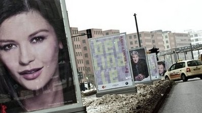 Posters featuring British actress Catherine Zeta-Jones, US actors Richard Gere and John C. Reilly are displayed in Berlin ahead of the 60th Berlin film festival. (AFP Photo) Posters featuring British actress Catherine Zeta-Jones, US actors Richard Gere and John C. Reilly are displayed in Berlin ahead of the 60th Berlin film festival. (AFP Photo)