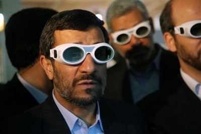 Iranian President Mahmoud Ahmadinejad, wears eye protection goggles as he visits an exhibition of Iran's laser science, in Tehran, Iran, Sunday, Feb. 7, 2010. Iranian President Mahmoud Ahmadinejad, wears eye protection goggles as he visits an exhibition of Iran's laser science, in Tehran, Iran, Sunday, Feb. 7, 2010.