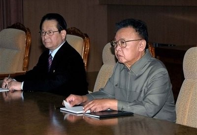 In this photo released by Korean Central News Agency via Korea News Service in Tokyo, North Korean leader Kim Jong Il, right, meets with senior Chinese Communist Party envoy Wang Jiarui, unseen, in Pyongyang, In this photo released by Korean Central News Agency via Korea News Service in Tokyo, North Korean leader Kim Jong Il, right, meets with senior Chinese Communist Party envoy Wang Jiarui, unseen, in Pyongyang,
