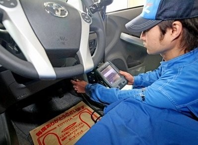A Toyota mechanic fixes the anti-lock brake software on a Prius hybrid vehicle at a dealer's repair shop in Aichi prefecture, central Japan on February 10. AFP photo A Toyota mechanic fixes the anti-lock brake software on a Prius hybrid vehicle at a dealer's repair shop in Aichi prefecture, central Japan on February 10. AFP photo