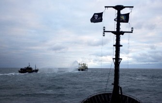 This handout photo received from anti-whaling activists Sea Shepherd Conservation Society on February 10, 2010 and taken on February 8, 2010 shows the Sea Shepherd ship Steve Irwin (L) exchanging water cannon fire with the Japanese whaling boat Nisshin Maru (C) in Antarctic waters. AFP PHOTO This handout photo received from anti-whaling activists Sea Shepherd Conservation Society on February 10, 2010 and taken on February 8, 2010 shows the Sea Shepherd ship Steve Irwin (L) exchanging water cannon fire with the Japanese whaling boat Nisshin Maru (C) in Antarctic waters. AFP PHOTO