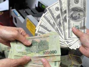 The State Bank of Vietnam on February 11 devalues the dong by 3.36 percent against the US dollar. This is the second time of devaluation of the dong for the past three months. (Photo: VnMedia) The State Bank of Vietnam on February 11 devalues the dong by 3.36 percent against the US dollar. This is the second time of devaluation of the dong for the past three months. (Photo: VnMedia)