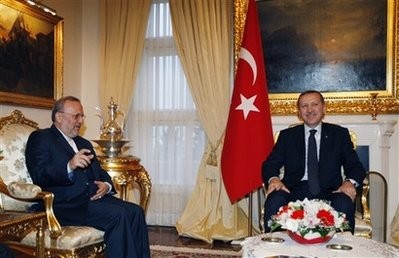Turkish Prime Minister Recep Tayyip Erdogan, right, and Iran's Foreign Minister Manouchehr Mottaki are seen during a meeting in Ankara, Turkey, Tuesday, Feb. 2, 2010. Turkish Prime Minister Recep Tayyip Erdogan, right, and Iran's Foreign Minister Manouchehr Mottaki are seen during a meeting in Ankara, Turkey, Tuesday, Feb. 2, 2010.