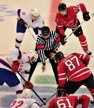The referee drops the puck at the start of the Men's Ice Hockey preliminary game between Canada and Norway during the Winter Olympics in Vancouver, Canada, on February 16. Canada won 8-0. AFP photo The referee drops the puck at the start of the Men's Ice Hockey preliminary game between Canada and Norway during the Winter Olympics in Vancouver, Canada, on February 16. Canada won 8-0. AFP photo