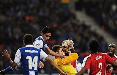 Arsenal's goalkeeper from Poland Lukasz Fabianski (C) catches the ball during their Champions League football match against Porto at Dragao Stadium in Porto Arsenal's goalkeeper from Poland Lukasz Fabianski (C) catches the ball during their Champions League football match against Porto at Dragao Stadium in Porto