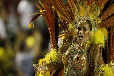 A member of Unidos da Tijuca samba school performs during carnival celebrations at the Sambodrome in Rio de Janeiro, early Monday, Feb. 15, 2010. A member of Unidos da Tijuca samba school performs during carnival celebrations at the Sambodrome in Rio de Janeiro, early Monday, Feb. 15, 2010.