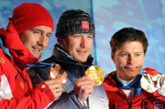 Gold medalist Bode Miller of the US (C), Croatia's silver medalist Ivica Kostelic (R) and Switzerland's bronze medalist Silvan Zurbriggen attend the medal ceremony for the men's Super Combined on February 21, 2010. AFP PHOTO Gold medalist Bode Miller of the US (C), Croatia's silver medalist Ivica Kostelic (R) and Switzerland's bronze medalist Silvan Zurbriggen attend the medal ceremony for the men's Super Combined on February 21, 2010. AFP PHOTO