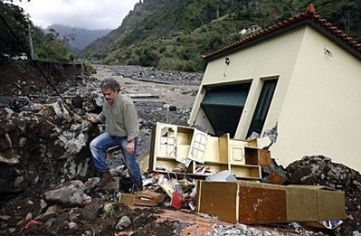 A man walks out of his destroyed house in Ribeira Brava, Madeira Island. AFP photo A man walks out of his destroyed house in Ribeira Brava, Madeira Island. AFP photo